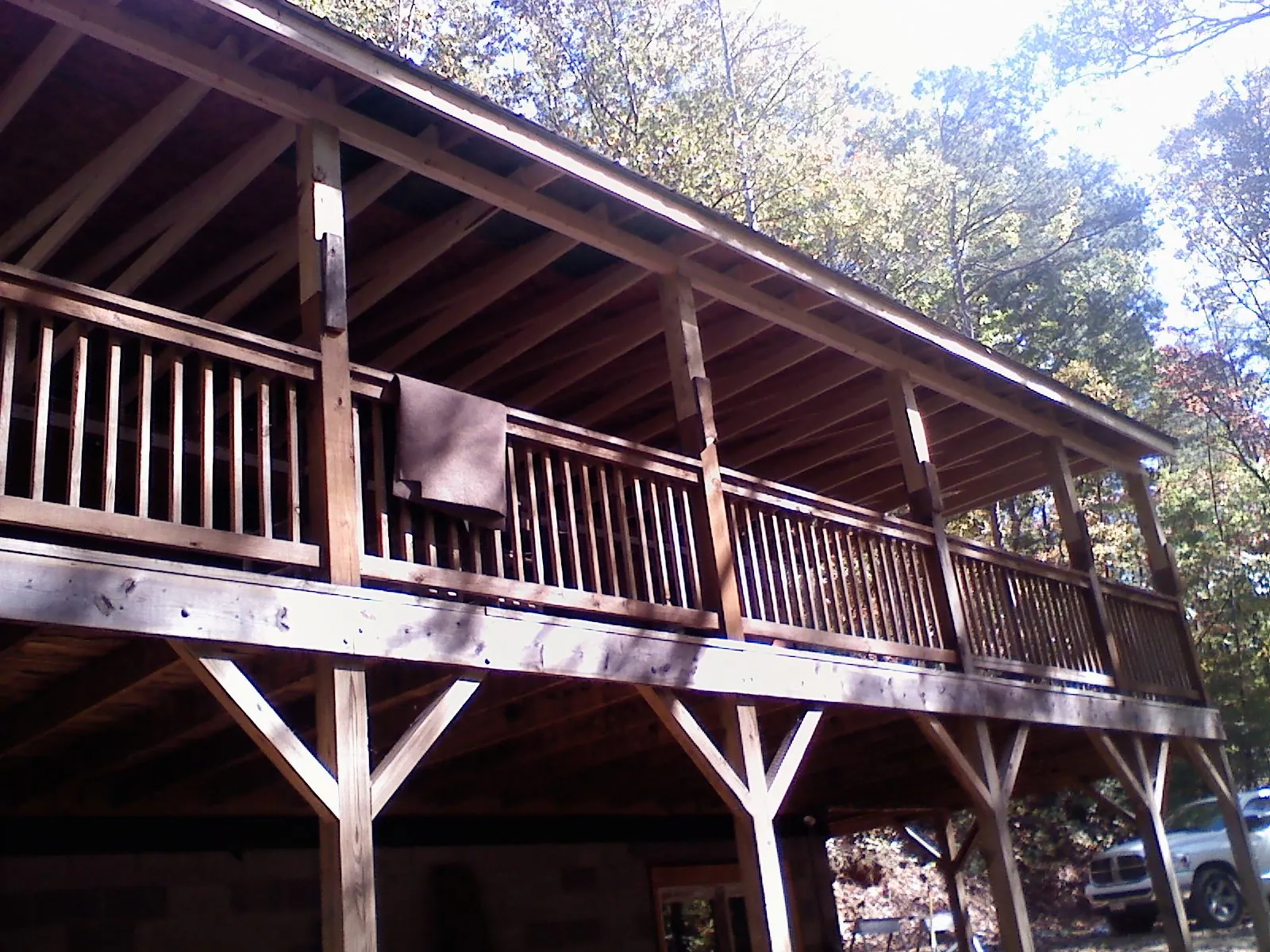 Timber framing under a new elevated porch and deck — Roof Leak Repair in Winnetka by Roofing Brothers